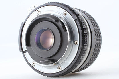 Nikon Ai Nikkor 28mm f/3.5 Wide Angle Lens w/ lens hood — Near Mint