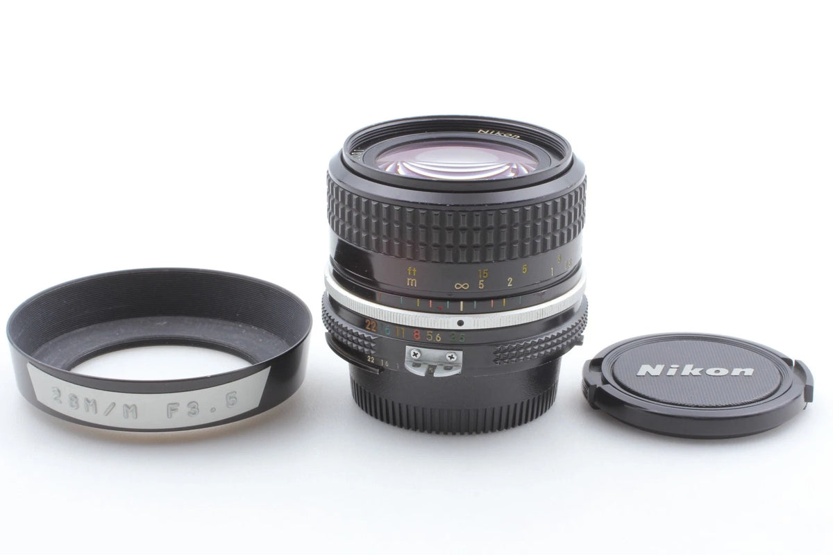Nikon Ai Nikkor 28mm f/3.5 Wide Angle Lens w/ lens hood — Near Mint