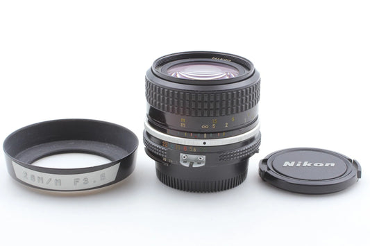 Nikon Ai Nikkor 28mm f/3.5 Wide Angle Lens w/ lens hood — Near Mint