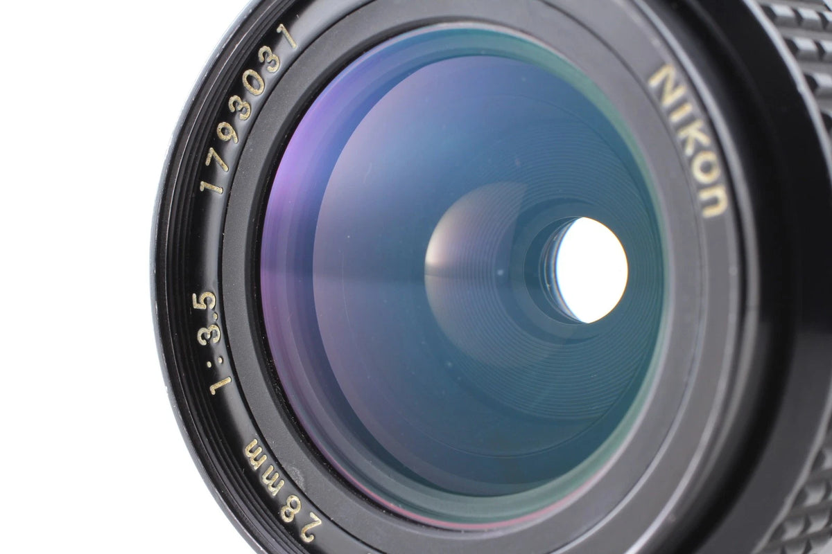 Nikon Ai Nikkor 28mm f/3.5 Wide Angle Lens w/ lens hood — Near Mint