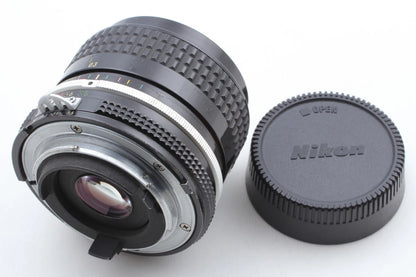Nikon Ai Nikkor 28mm f/3.5 Wide Angle Lens w/ lens hood — Near Mint